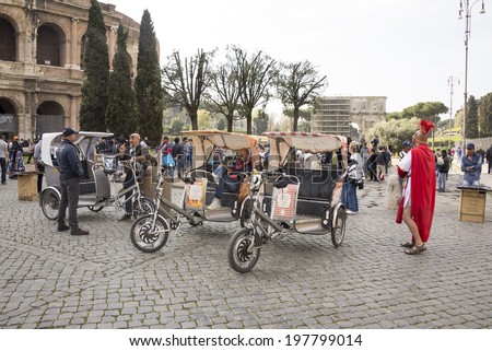 ROME,ITALY-APRIL 02-The wait staff expects strolling tourists at the Colosseum on April 02, 2014 in Rome