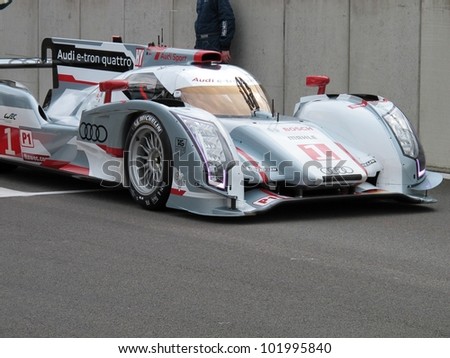 SPA, BELGIUM - MAY 4: Swiss racing driver Marcel FÃ?Â¤ssler leaving the pitlane in the new Audi R18 e-tron quattro hybrid prototype car at circuit Spa-Francorchamps May 4, 2012 in Spa, Belgium.