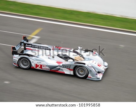 SPA, BELGIUM - MAY 4: Italian racing driver Dindo Capello driving the new Audi R18 e-tron quattro hybrid prototype car at circuit Spa-Francorchamps May 4, 2012 in Spa, Belgium.