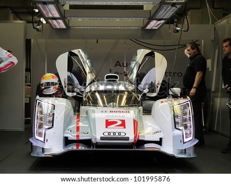 SPA, BELGIUM - MAY 2: The new Audi R18 e-tron quattro hybrid prototype car in the pits before the first race at circuit Spa-Francorchamps May 2, 2012 in Spa, Belgium.