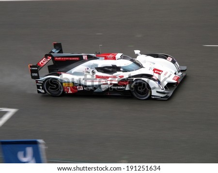 SPA-FRANCORCHAMPS, BELGIUM - MAY 2: No. 1 Audi e-tron quattro hybrid race car on a wet track during round 2 of the FIA World Endurance Championship on May 2, 2014 in Spa-Francorchamps, Belgium.