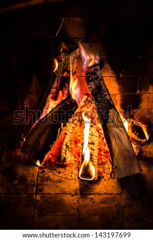 Great Home Firewood burning in brick fireplace