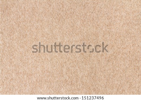 Knitting background texture light beige color. High resolution Knit woolen Fabric textile background
