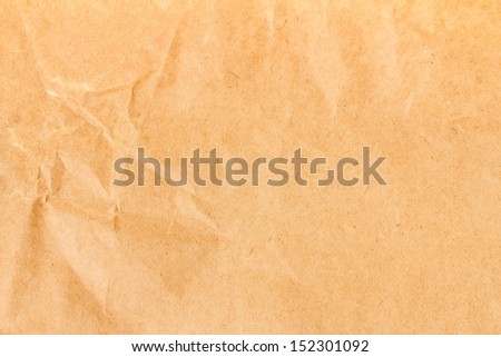 Crumpled yellow  recycled paper  texture or background. Vintage craft paper texture. Paper for package.