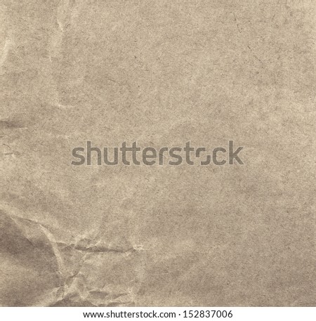 Crumpled textured natural  recycled paper  texture or background. Vintage craft paper texture. Paper for package.