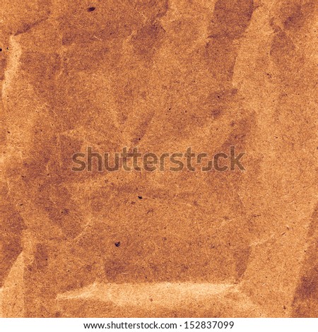 Textured crumpled recycled vintage  natural paper background. High resolution recycled brown cardstock with halftone