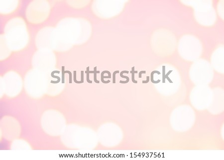 Bright abstract Christmas background with glowing bokeh. Pink and Gold Festive Christmas background.
