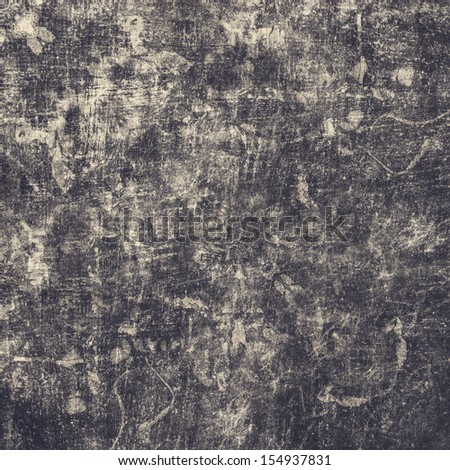 Dark abstract grunge paper background with space for text or image. Textured paper background in cool black and white tones.