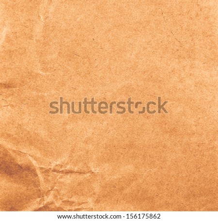 Old Crumpled recycled paper  texture or background. High resolution recycled brown cardstock with halftone