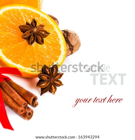 Fresh orange, Anise star, Cinnamon stick isolated. Spices for hot mulled wine isolated on white background, closeup.