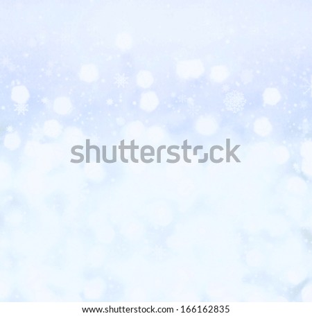 Defocused Bokeh  Vintage background. Blue and white festive blur backgrouns. Christmas background.