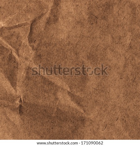 High resolution Crumpled textured  recycled paper  background. Vintage craft cardstock texture dark brown color. Paper for package.