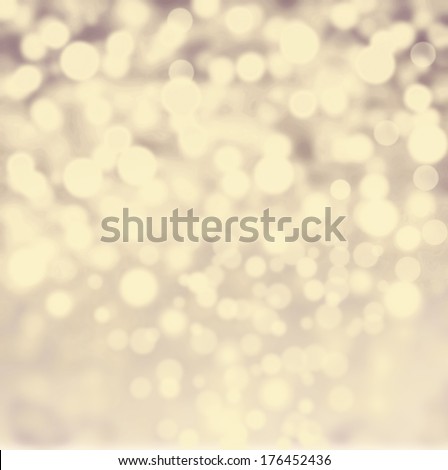 Abstract bokeh lights vintage background with defocused golden lights. De focussed background with sparkles, fine art, soft focus, greeting holiday card, festive frame, magic lights, shiny wallpaper
