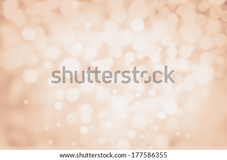 Abstract Defocused  Bokeh light Vintage background. Elegant Party, Holidays and Christmas background with blur golden lights.