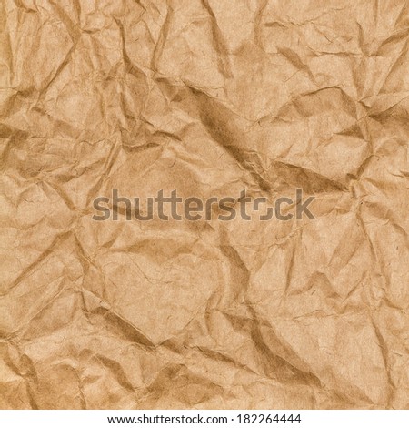 Crumpled paper texture background. Craft paper sheet, brown color. Texture of crumpled paper.