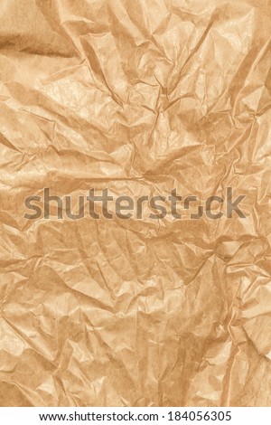 Crumpled paper texture background. Craft paper sheet, brown color. Texture of crumpled paper.