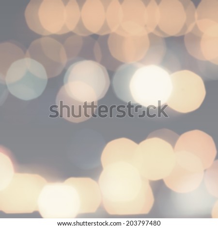Night Abstract Defocused Bokeh light vintage background. Soft light abstract background with golden lights.