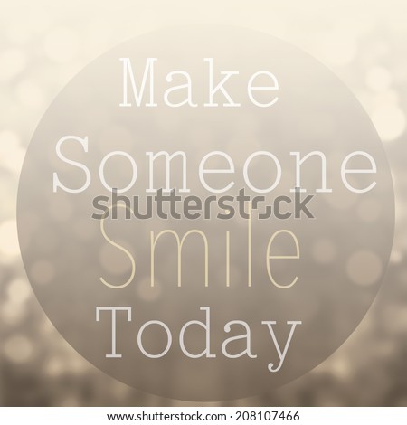 Beautiful Motivational quote  with message Make Someone Smile Today over abstract bokeh background