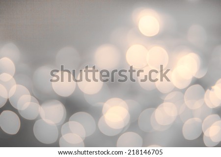Vintage Christmas background with bokeh lights.  Defocused Bokeh twinkling Lights Festive holiday party  background.