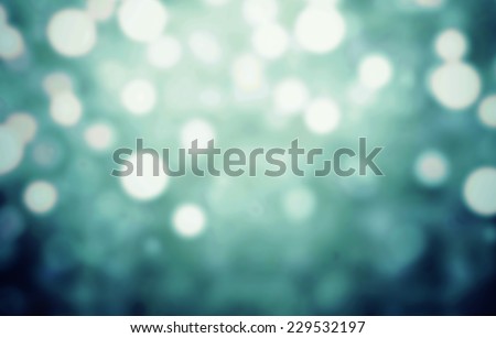 Dark Festive Christmas lights background. Defocused Bokeh twinkling Lights Festive holiday party background with blurry special magic effect.