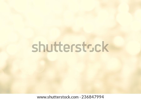 Sparkling Lights Festive background with texture. Abstract Christmas twinkled bright background with bokeh defocused silver and golden lights