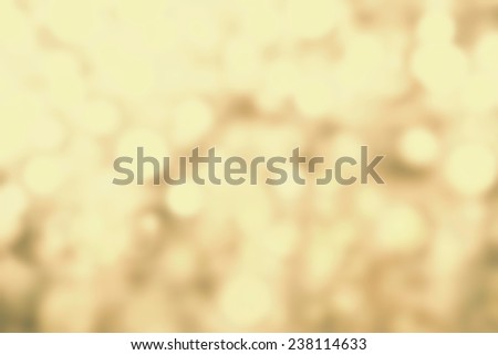 Festive blur background with natural bokeh and bright golden lights. Abstract Christmas twinkled bright background with boke defocused  golden lights