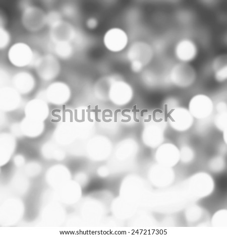 Silver Lights Festive Christmas  background with texture. Abstract Christmas twinkled bright background with bokeh defocused  lights