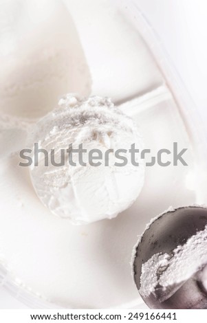 Vanilla ice cream scoop closeup. White  Ice Cream Background macro