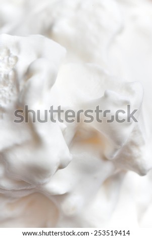 White Vanilla Soft Ice Cream Background. Beige textured cream backdrop, milk swirl background