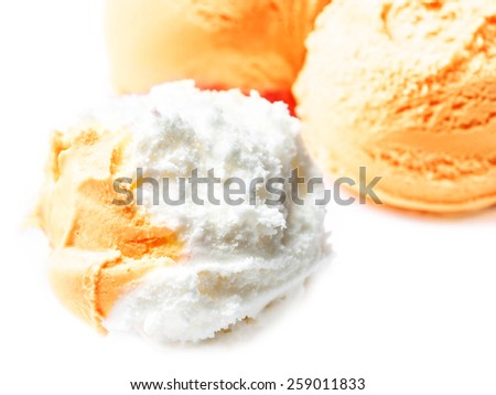 Vanilla and  Orange Fruit  Ice Cream Balls Macro. Beautiful Scoops of  Ice-Cream  close up.