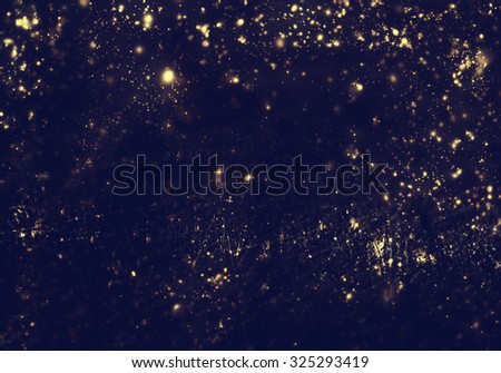 Abstract background - golden lights, flash , night city, lens flare. Abstract fractal black and dark gold wallpaper