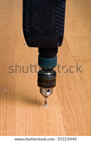 drilling a hole using power drill