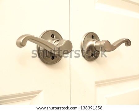Pewter french door handles on cream doors