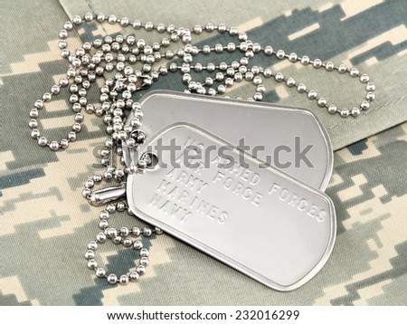 Camouflage uniform with dog tags