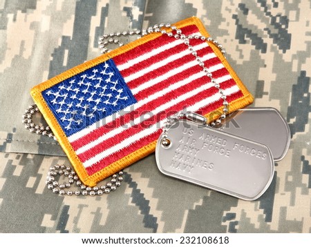 Camouflage uniform, dog tags, American Flag