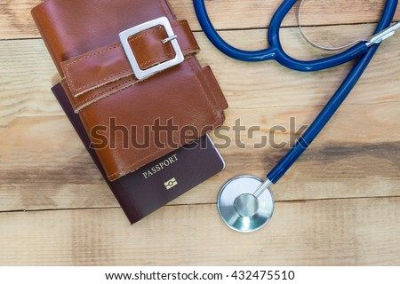 Medical tourism concept. Stethoscope with passport.