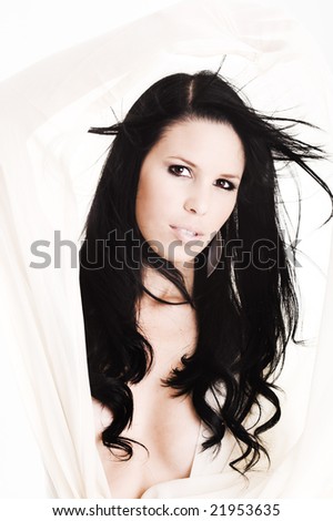 Young woman with long dark flying hair
