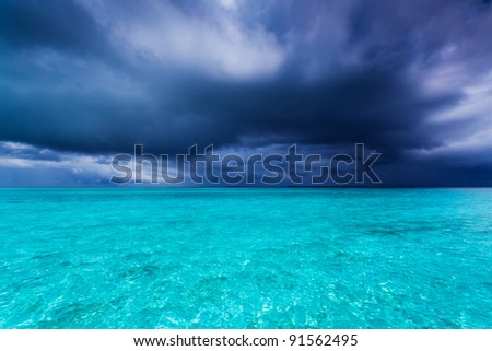 Summer storm during rain season in tropics over ocean