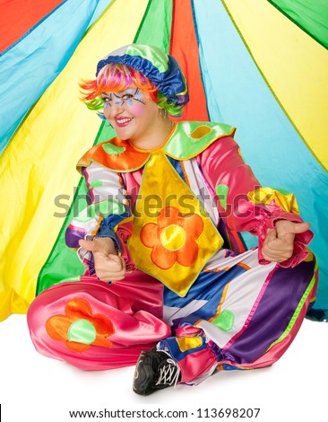 Clown is making fun on colorful background