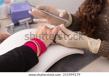 nail filing in beauty center