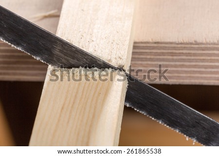 sawing wood