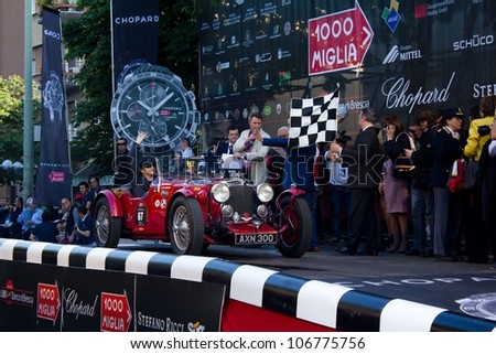 BRESCIA ITALY - MAY 17: red 1933 Aston Martin Le Mans driven by M. Elicabe starts the 1000 Miglia 2012, on May 17, 2012 in Brescia