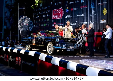 BRESCIA ITALY - MAY 17: Black 1956 Ford Thunderbird driven by S. Burger starts the 1000 Miglia 2012, on May 17, 2012 in Brescia