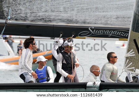 GARGNANO (BS) ITALY - SEPTEMBER 2: crew of stravaganza sailing boat, skipper Carlo Fracassoli, wins the Trofeo Gorla regatta, on September 2, 2012 in Gargnano (BS)