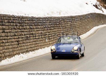 SAN MARTINO DI CASTROZZA, ITALY - FEBRUARY 22: A blue Porsche 911 S takes part to the WinteRace classic car race on February 22, 2014 in San Martino di Castrozza. This car was built in 1967.