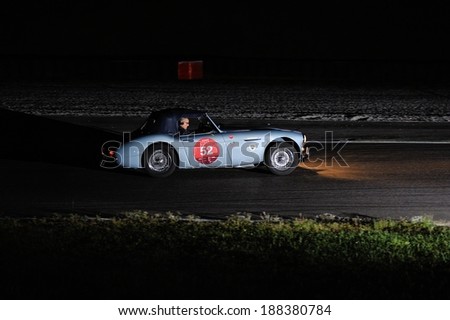 CASTREZZATO, ITALY - APRIL 11: A light blue Austin Healey 100/6 BN4 takes part to the Franciacorta Historic classic car race on April 11, 2014 in Autodromo di Franciacorta. This car was built in 1956.