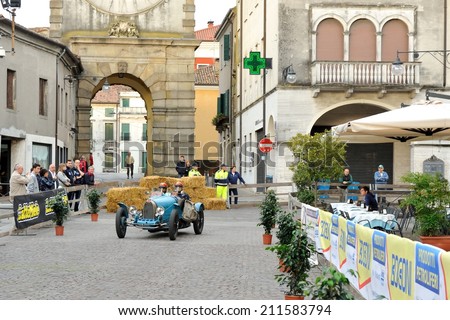 ESTE (PD), ITALY - MAY 16: A light blue Bugatti T35A takes part to the 1000 Miglia classic car race on May 16, 2014 in Este. The car was built in 1926