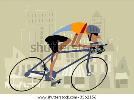 Cyclist racing along a street
