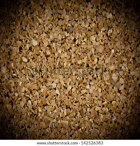 Background texture of cork board closeup with vignette