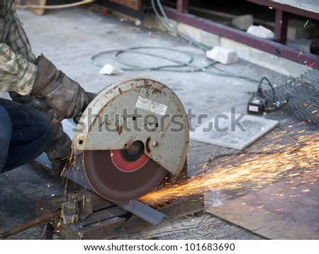 man cut steel